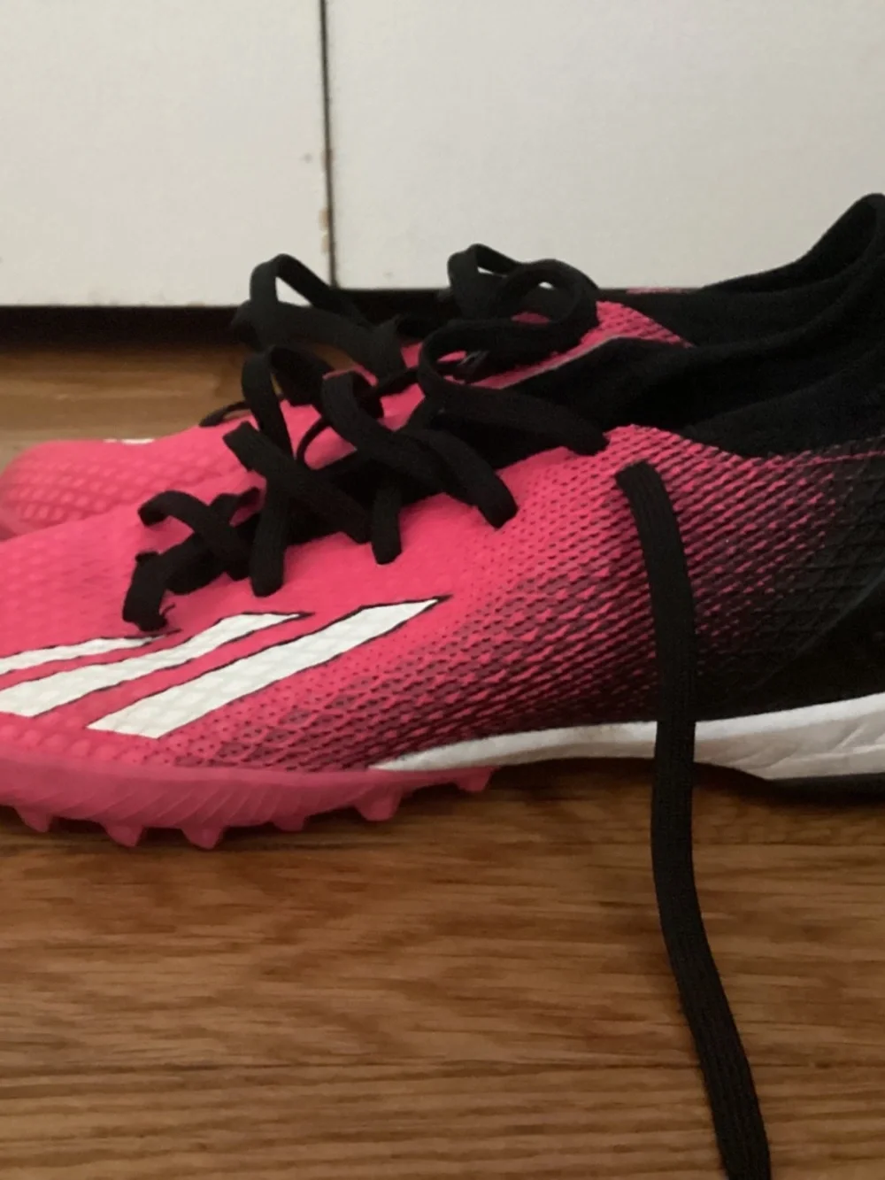 Pink adidas size 4 soccer turf shoes